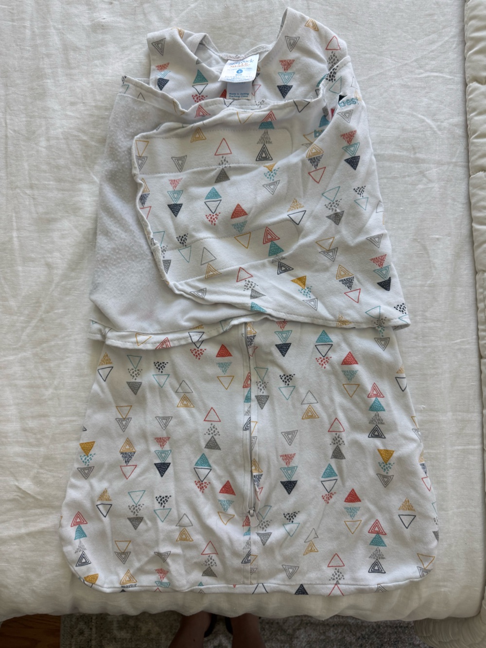 Halo SleepSack Swaddle in White with Geometric triangle design